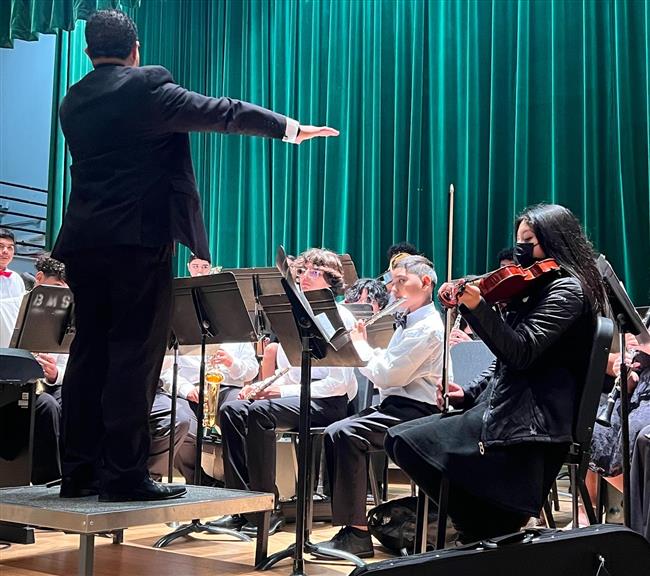 Mr Glenn directing the orchestra